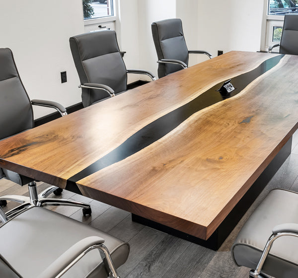 This striking Walnut River Epoxy Conference Table will sure to be the first thing on the agenda. It will give any boardroom or meeting room a stunning breathtaking aura. Our conference tables are made from reclaimed premium wood.