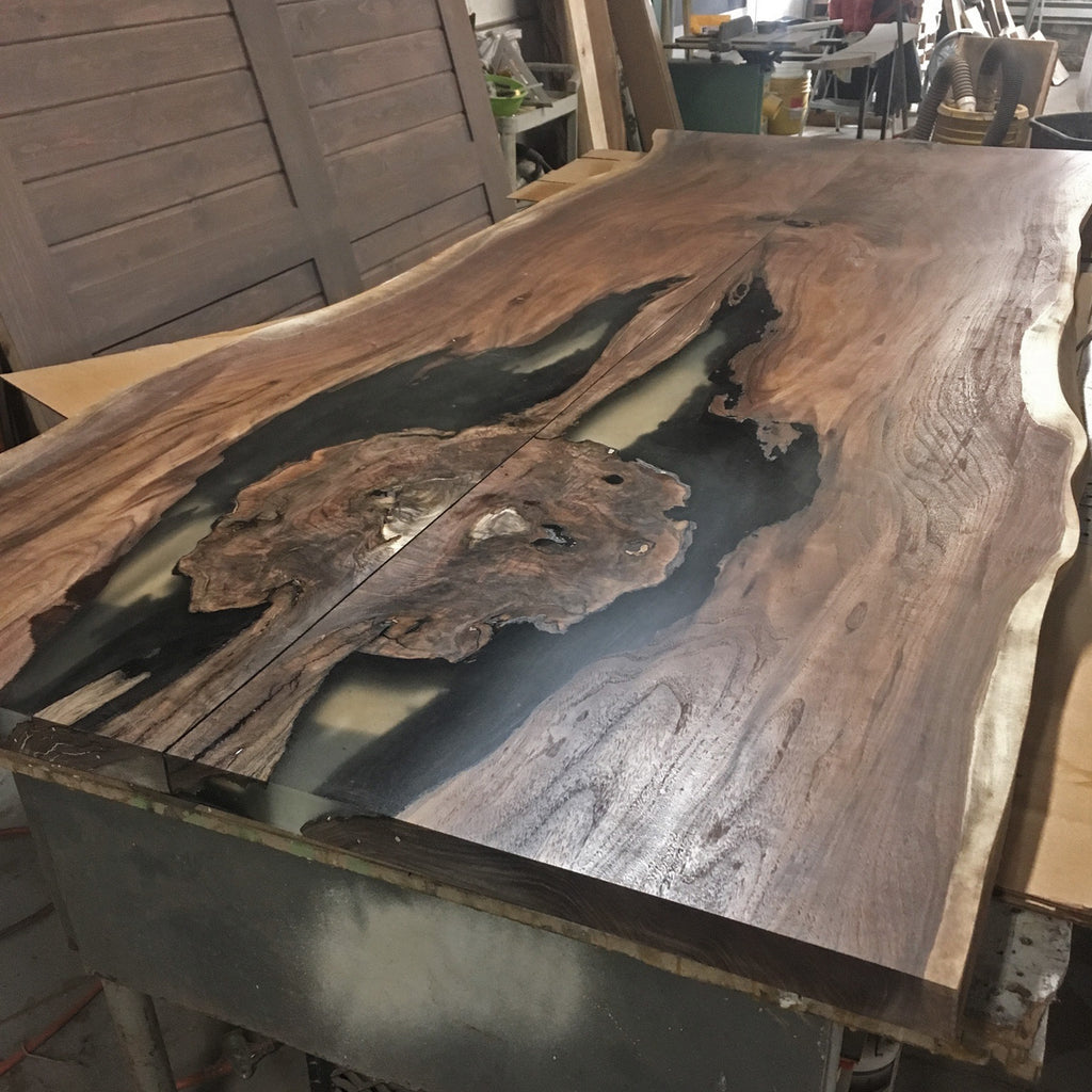This gorgeous Live Edge Reclaimed Rosewood table will be the stand out piece in your home. Its deep reddish brown hue's provide warmth and individuality to any space in your home.