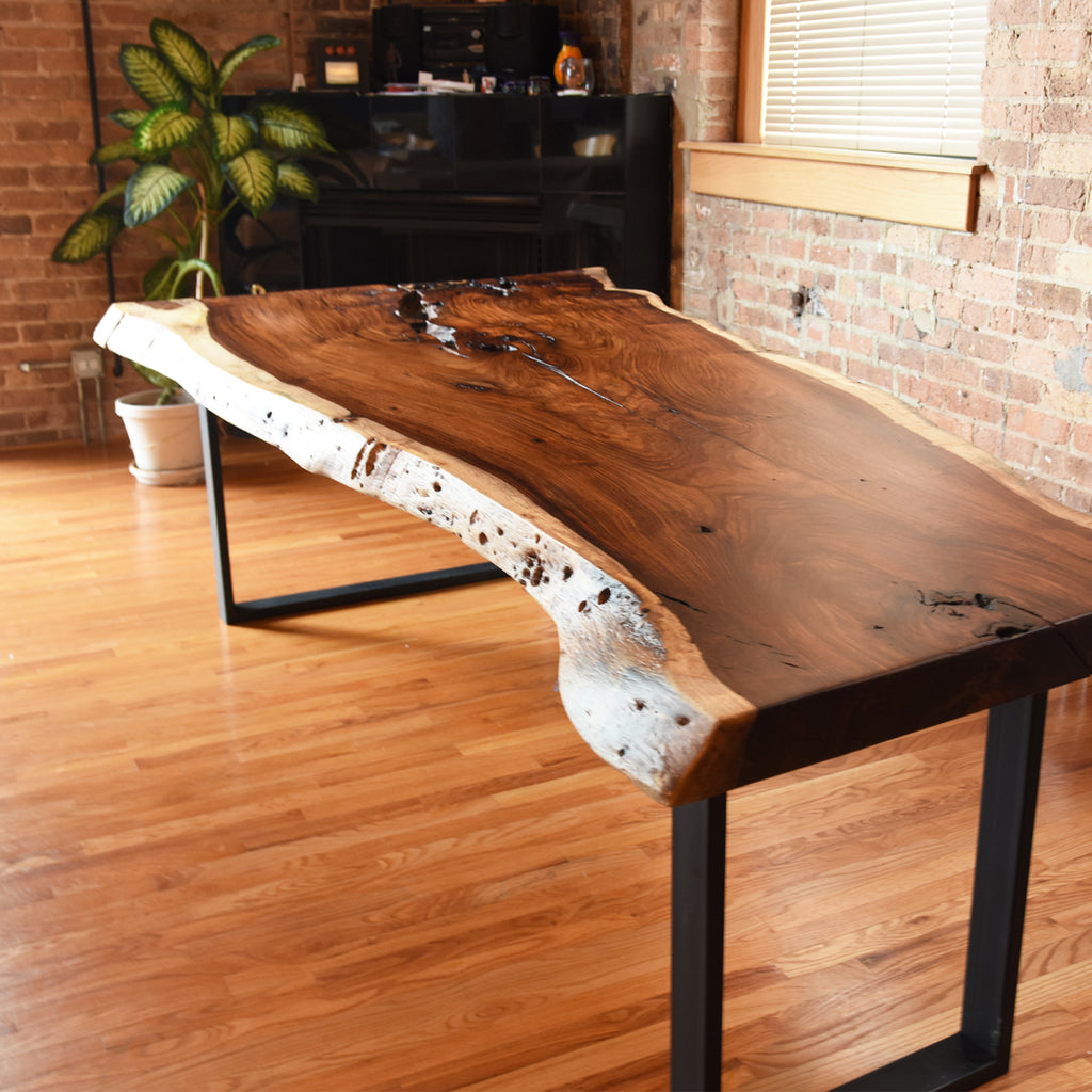 This beautiful Reclaimed Live Edge Table will serve as a stunning centerpiece for any room in your home.