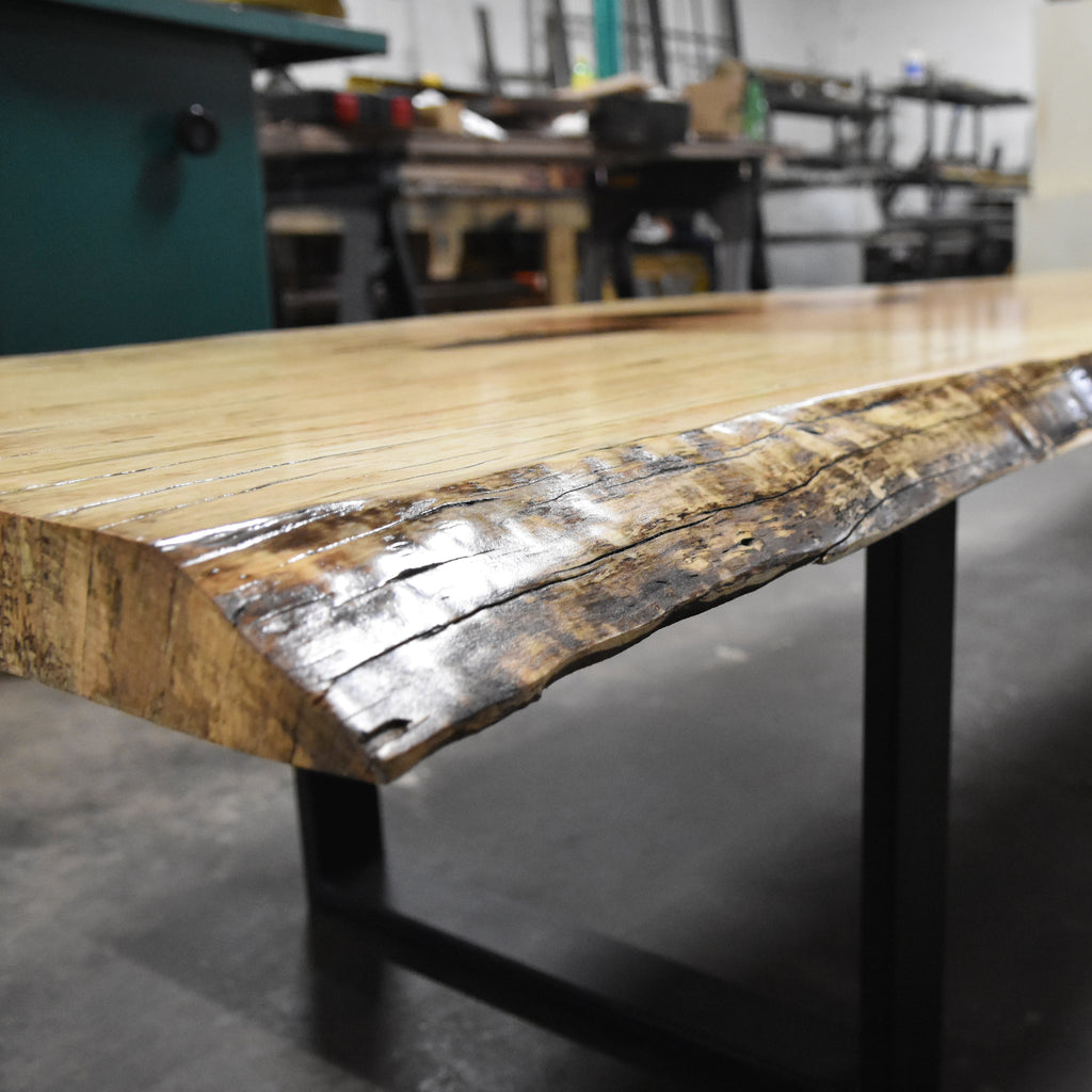 This beautiful Live Edge Reclaimed Oak table will serve as a stunning centerpiece for any room in your home.