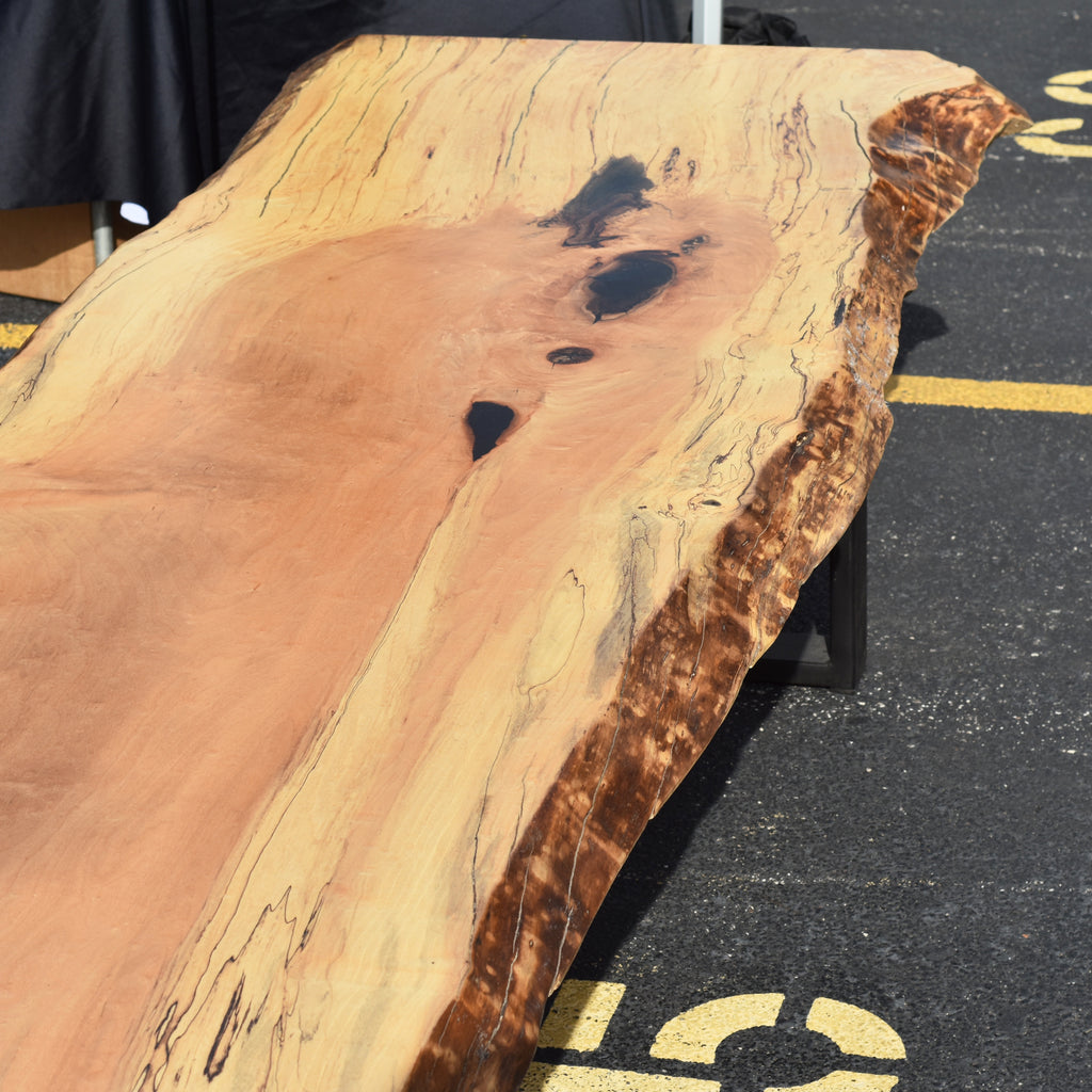 This beautiful Live Edge Reclaimed Oak table will serve as a stunning centerpiece for any room in your home.