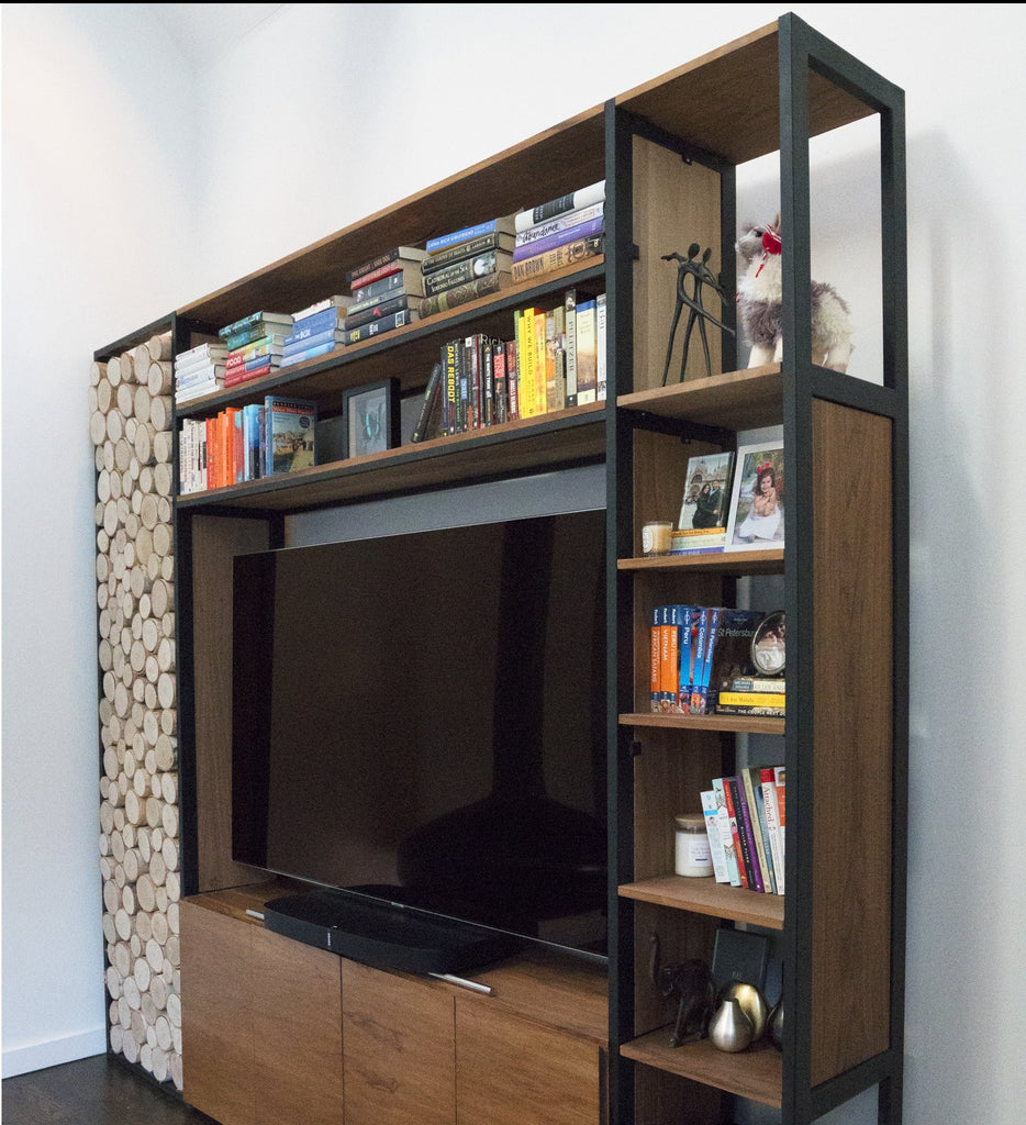This tailor made entertainment system is the perfect addition for your family room or den. It provides essential shelf space while giving a sophisticated look to your room. It can be made according to your custom specifications and design. 