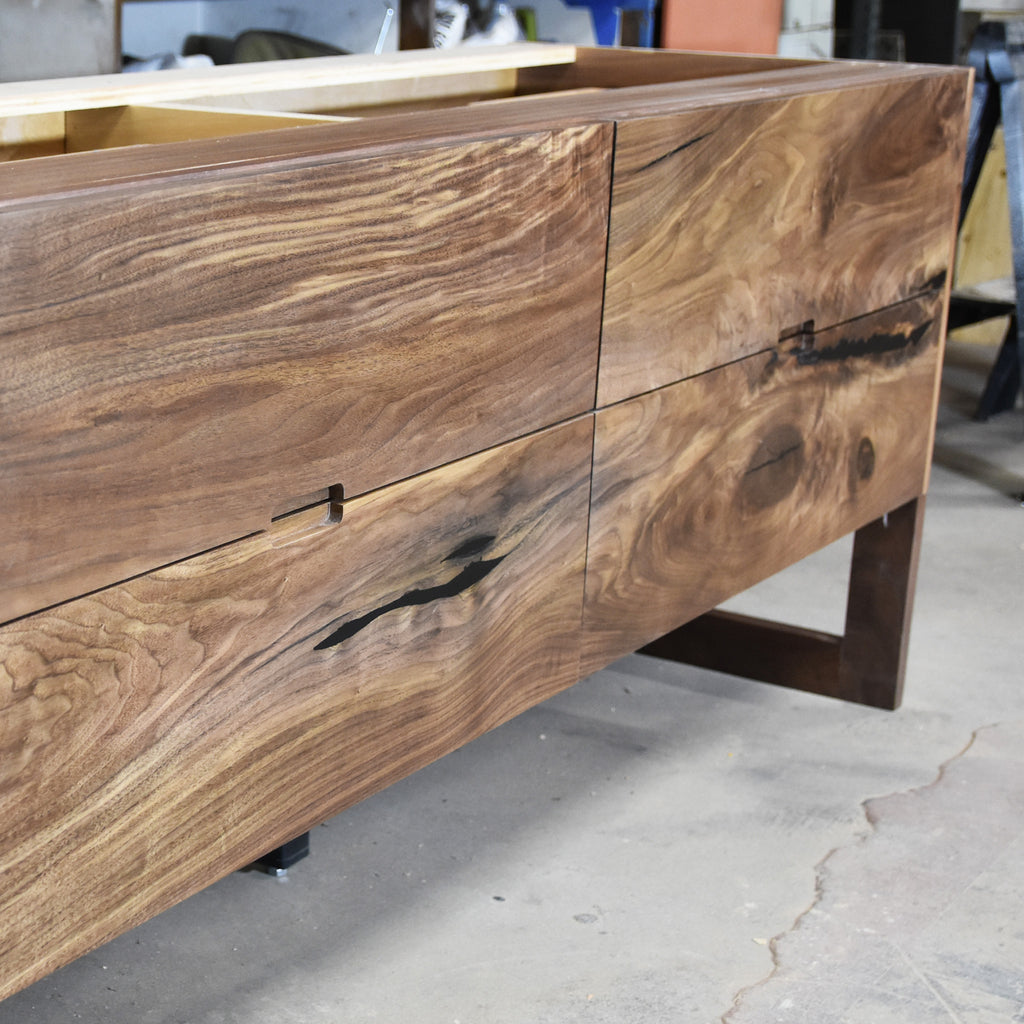 This beautiful Live Edge bathroom vanity has spacious drawers and beautiful visible wood grain, giving your bathroom a rustic feel.